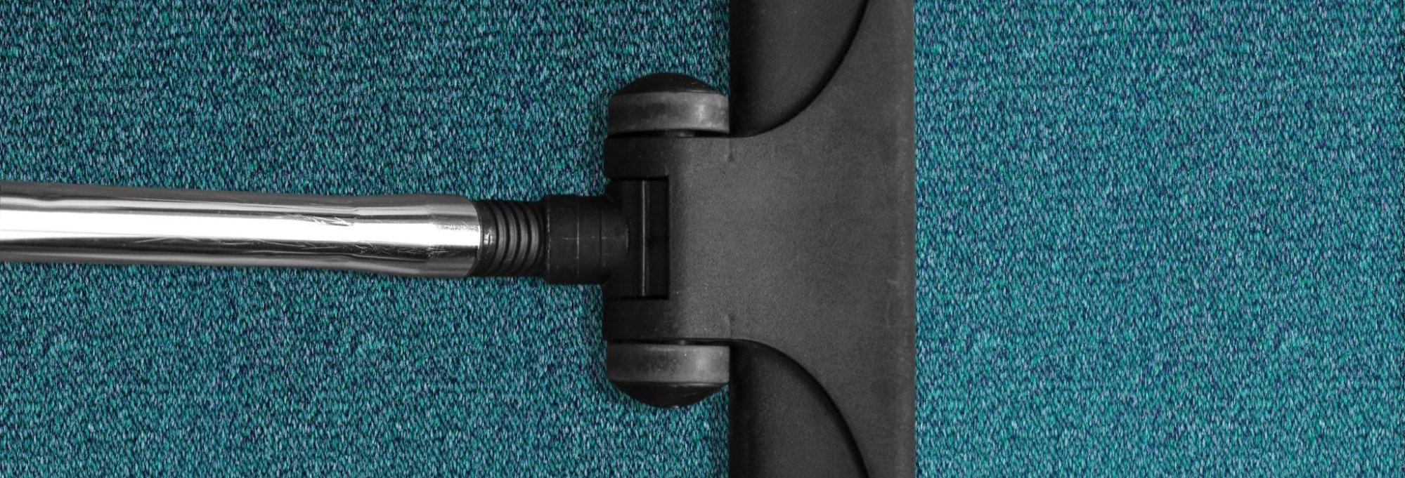 VACUUM CLEANING CARPET